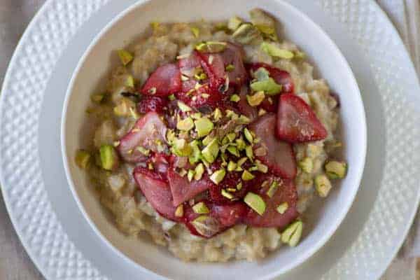 Roasted Strawberry and Pistachio Morning Oats recipe @beardandbonnet www.thismessisours.com }