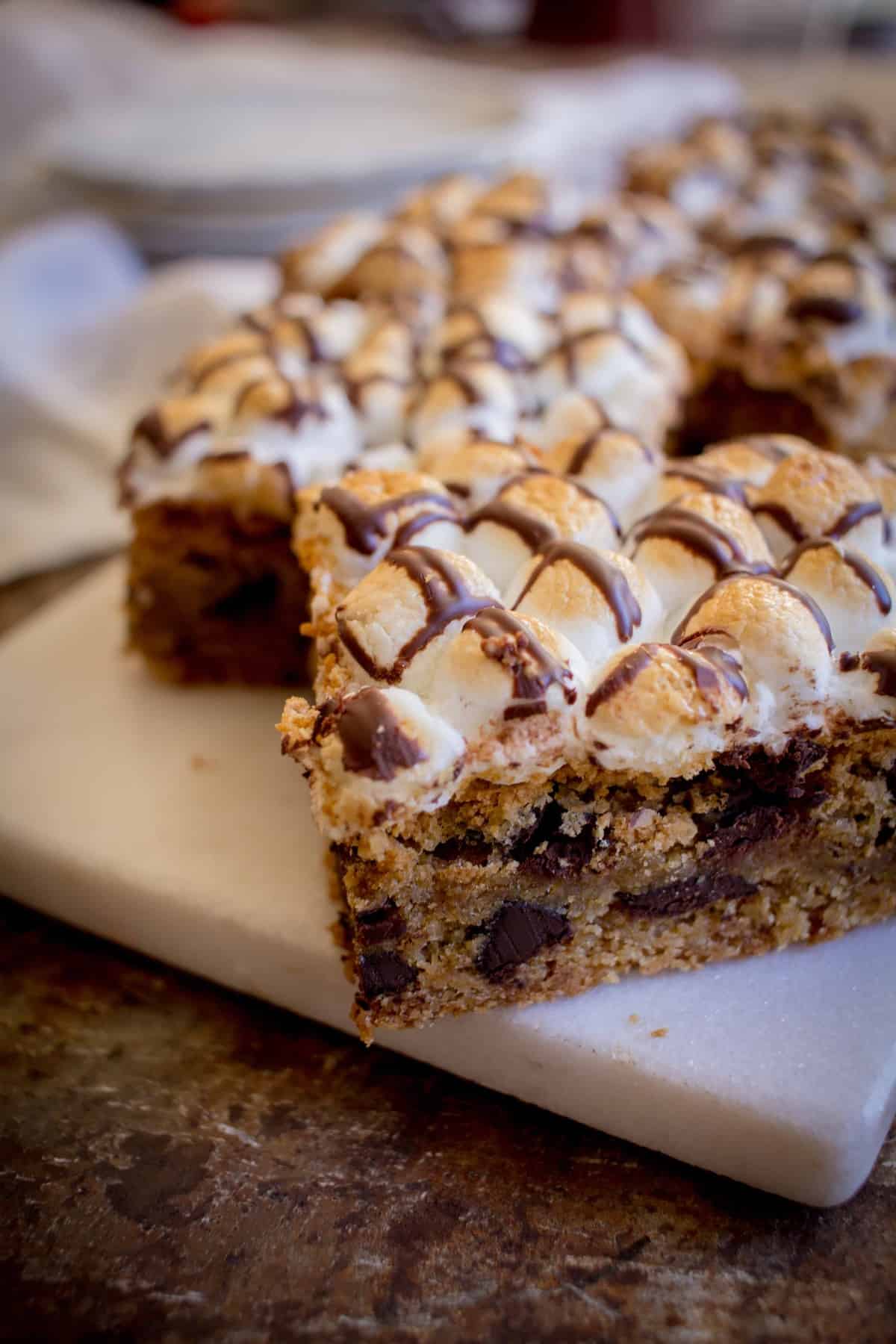 Chocolate Chip S'mores Cookie Bars recipe by @beardandbonnet on www.thismessisours.com