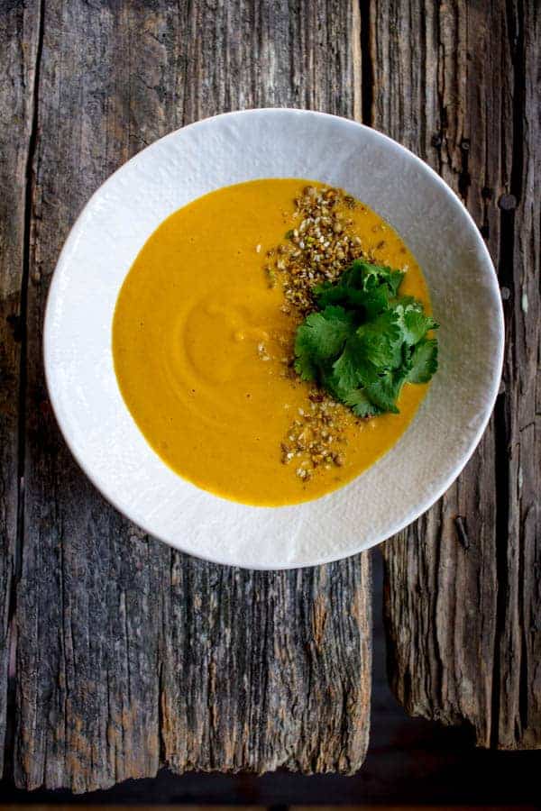 Creamy Roasted Carrot Soup with Citrus & Dukkah recipe by @beardandbonnet on www.thismessisours.com