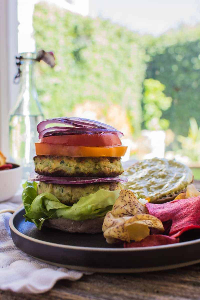 Summer squash will never be the same: Zucchini Fritter Veggie Burger on @beardandbonnet 