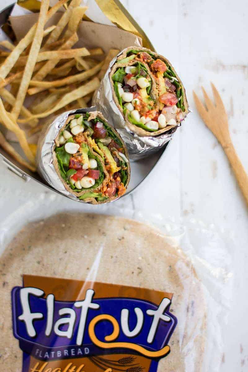 We're packing teen friendly lunches with @FlatOut wraps! Get the recipe for this Best Ever Taco Salad Wrap on @beardandbonnet