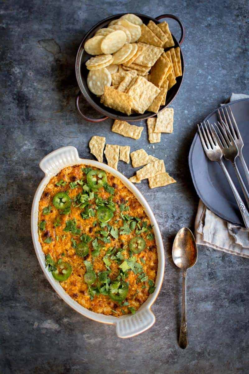 Hosting a football party? Add this Cauli-Ranch Buffalo Dip to your game day menu. Recipe on @beardandbonnet