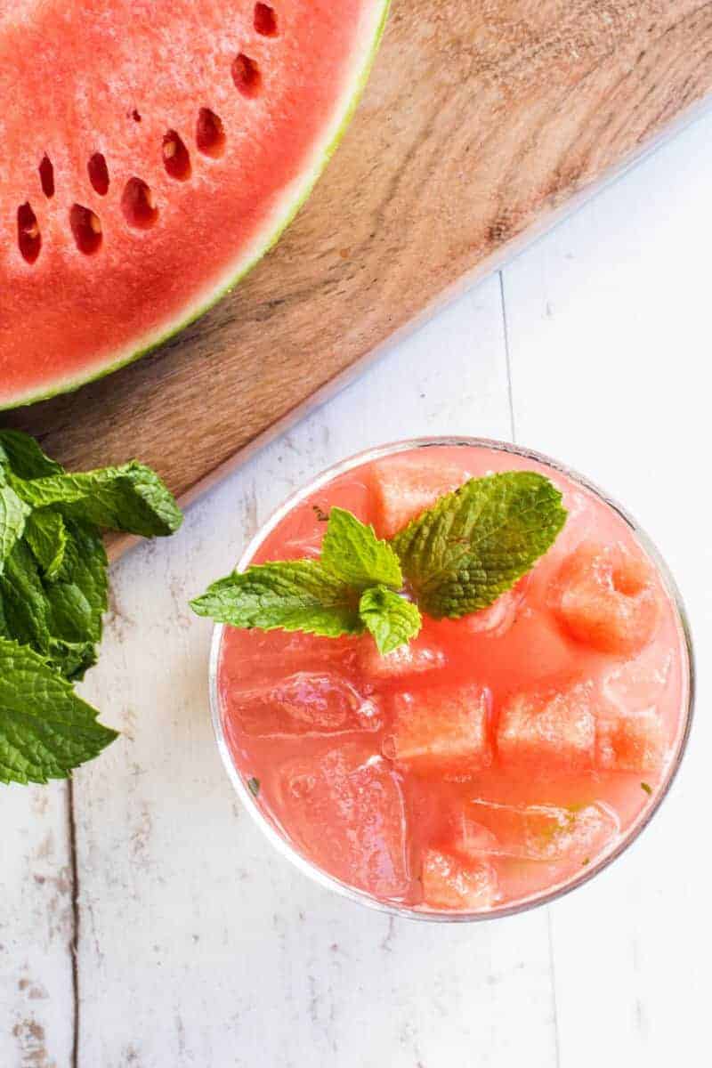 It takes less than 5 minutes to shake up a few of these Easy Melon Mojitos and they are the perfect way to #DrinkTheSummer Recipe on @beardandbonnet
