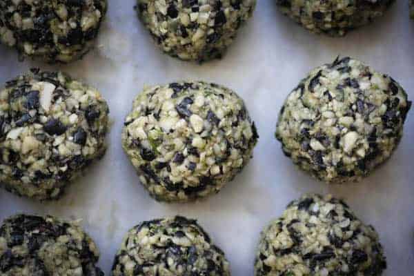 Black Bean Falafel ready to be cooked on a baking sheet