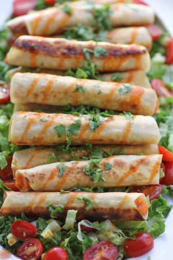 Sweet Potato & Lime Taquitos on a serving platter 