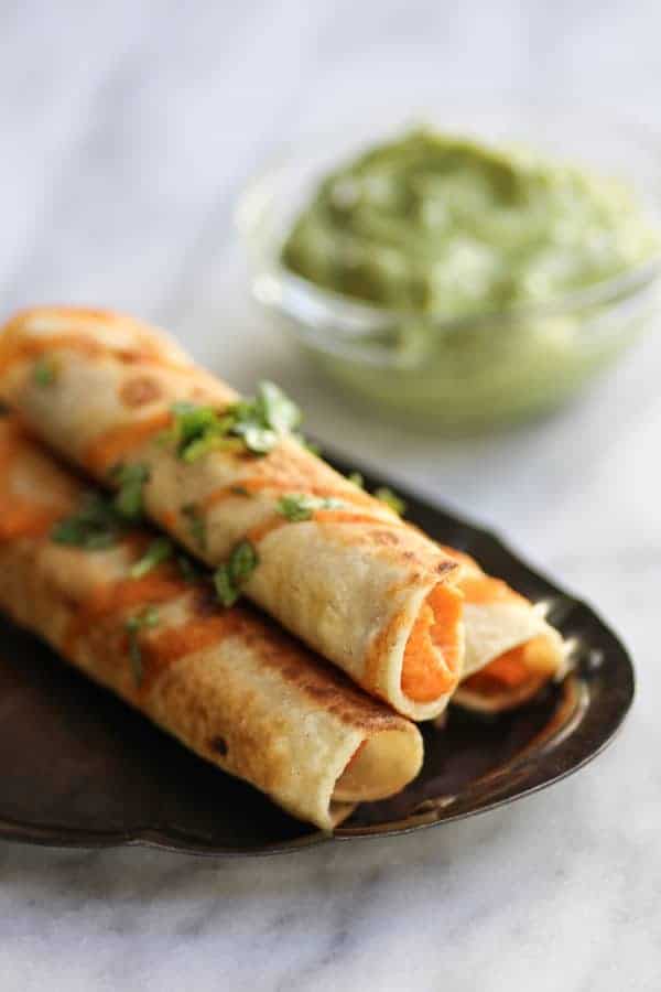 Sweet Potato & Lime Taquitos recipe || Tangy, sweet, and a tad bit spicy. The perfect taquito for just about any occasion! || @thismessisours #glutenfree #vegan