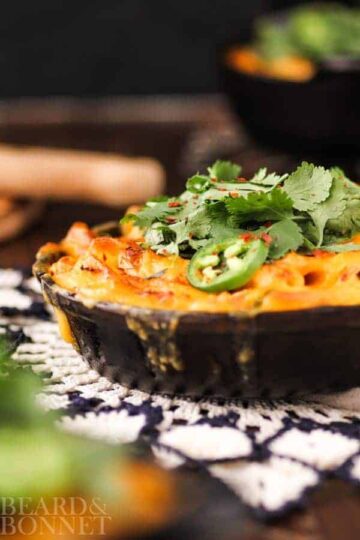 Get ready for a total mac and cheese game changer!!! This kimchi mac and cheese is spicy, tangy, and creamy with a perfectly golden, crispy top. Each bite gets an extra flavor punch from a special mixture of fresh herbs.