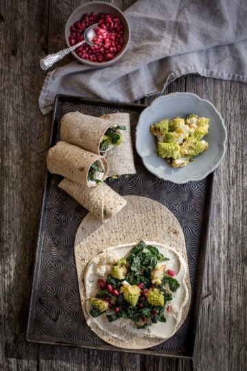 Roasted Romanesco Wraps with Hummus & Pomegranate recipe by @beardandbonnet on www.thismessisours.com