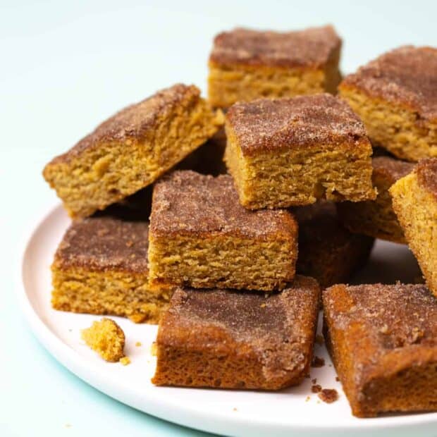 brown butter snickerdoodle blondies on white plate