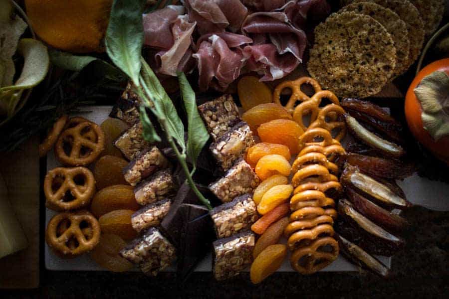 5 Tips for Building the Ultimate Holiday Charcuterie Board || Take it easy on yourself! You don't have to make every single thing from scratch. Throw in a few of your favorite store bought indulgences like goodnessknows snack squares, who knows maybe your guests will find a new favorite snack! || @gfsnacksquares #goodnessknows #tryalittlegoodness #spon