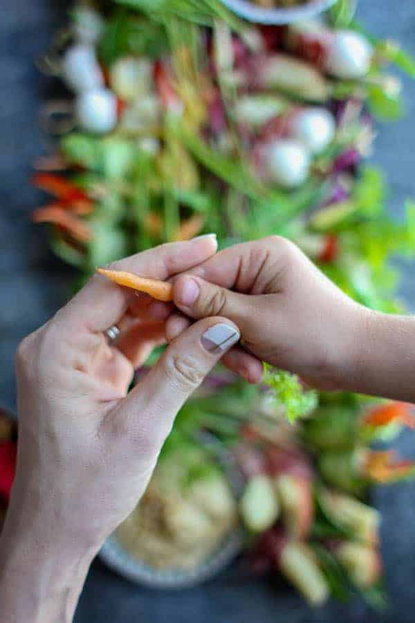 Kid Friendly Mezze Platter recipe || Just in time for summer picnics and and al fresco dinners. This platter is full of kid friendly eats that adults will love too! How adorable are these baby veggies? || @thismessisours @sabra #glutenfree #spon