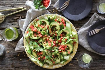 Avocado Avenger Salad recipe || This dreamy summer salad is from @theblendergirl 's cookbook The Perfect Blend! Gorgeous avocados over a bed of zucchini ribbons filled with chimichurri then sprinkled with watermelon, tomato, and toasted watermelon seeds. Summer perfection! || @thismessisours #glutenfree #vegan