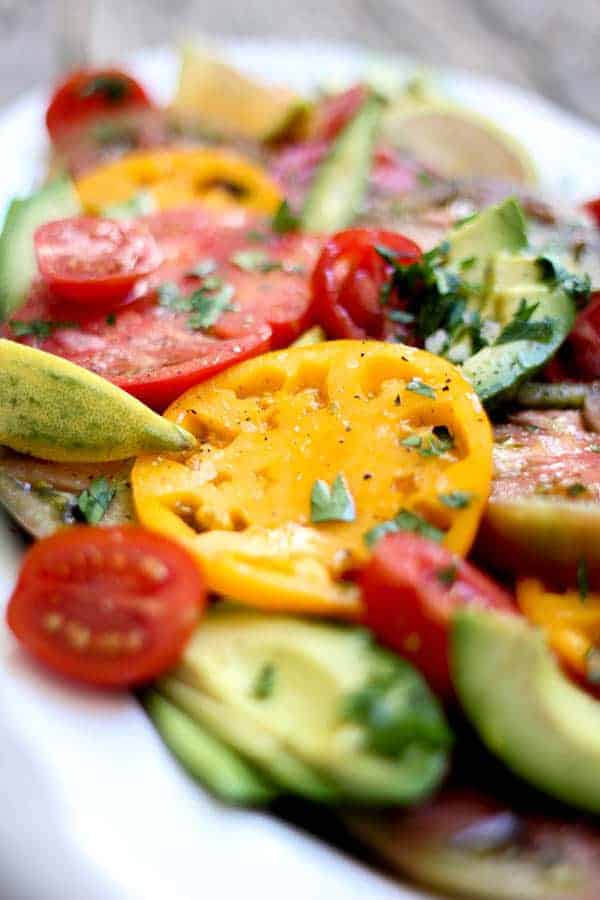 Simple Tomato and Avocado Salad recipe || Summers best tomatoes shine in this dish with just a hint of seasonings. || #VirtualMidsummerPotluck4Peace #vegan #glutenfree