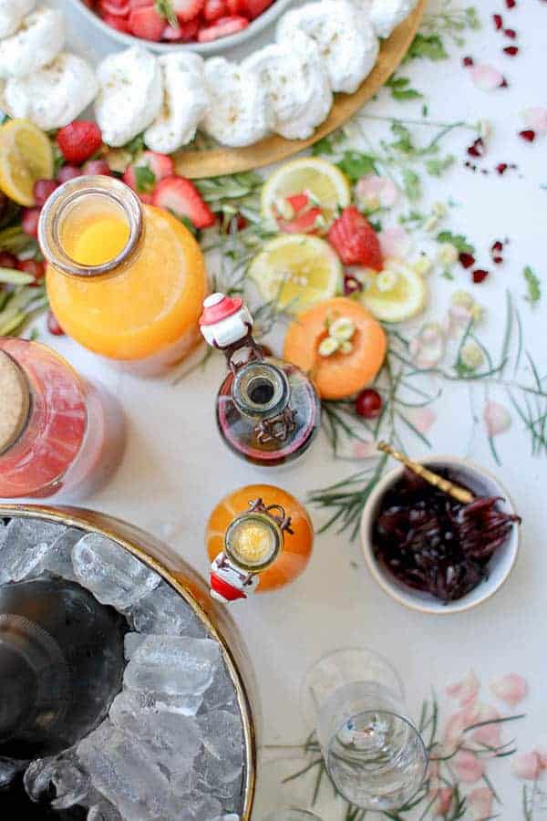 Apricot Orange Blossom Syrup recipe || Whether you are setting up a DIY champagne bar or just mixing up some fun fruit flavored sodas for the kids this summer, this apricot and orange blossom syrup is sure to produce the perfect sip every time! || @thismessisours #FriendsWhoFete #vegan #glutenfree