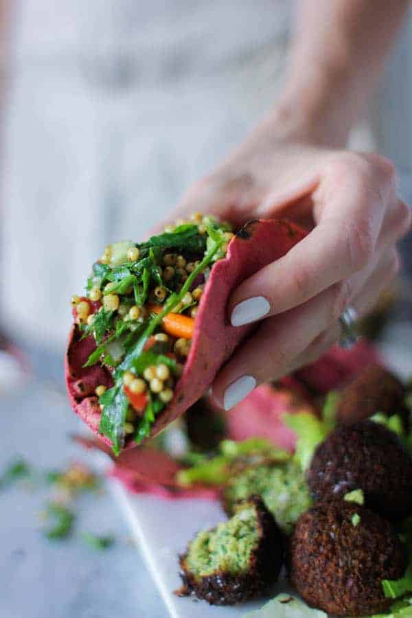 Perfectly Pink Tortillas recipe || We can't get enough of the color pink and these gorgeous tortillas are just the perfect shade with the help of a little @nutsdotcom beet powder! Fill them with black beans, taco meat, or our favorite falafel. || @thismessisours #glutenfree #vegan #taconight