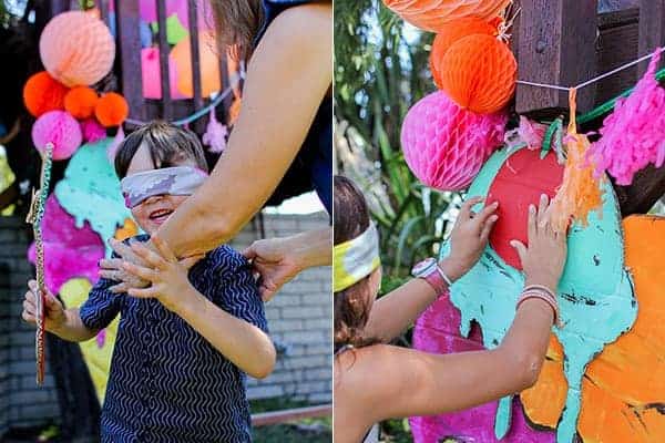 How to Host an Ice Cream Social || We gave the old school game of pin the tail on the donkey a modern twist, by creating a giant ice cream cone out of cardboard pieces and letting the kids take turns trying to pin the cherry on top! || @thismessisours #FriendsWhoFete