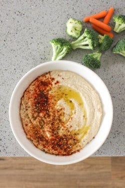 Homemade hummus with paprika sprinkled on top
