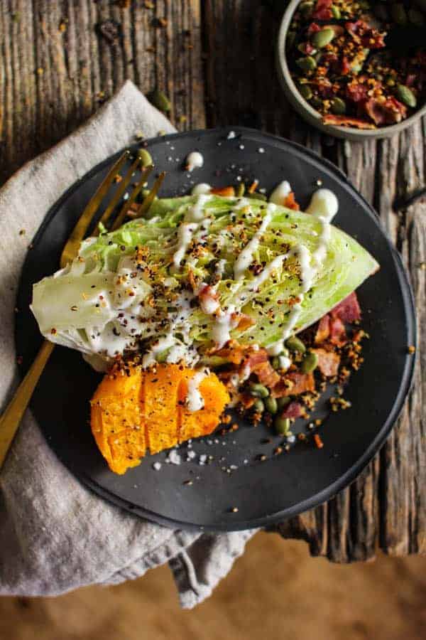 Roasted Butternut and Ranch Autumn Wedge Salad recipe || Butternut squash truly shines in this ranch smothered wedges salad with garlic laced crispy quinoa and smoky bacon. || @thismessisours @litehousefoods #spon