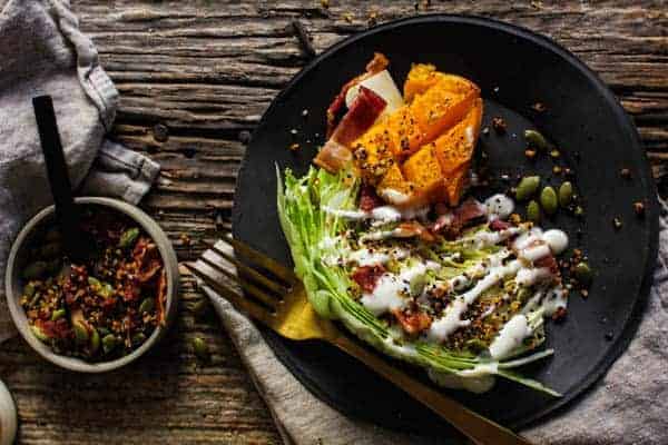 Roasted Butternut and Ranch Autumn Wedge Salad recipe || Butternut squash truly shines in this ranch smothered wedges salad with garlic laced crispy quinoa and smoky bacon. || @thismessisours @litehousefoods #spon