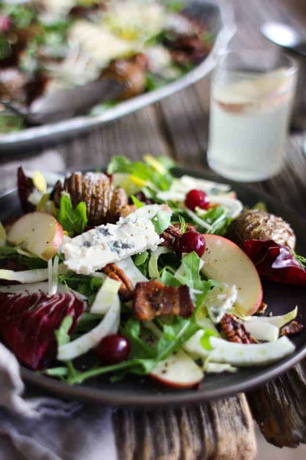 Orchard Inspired Holiday Salad recipe || I love all of the flavors of fall, but apple just happens to be my all-time favorite. This salad is brimming with apple goodness and all of the flavors that pair so well with it like Simply Artisan Reserve Gorgonzola Center Cut Cheese, crispy bacon, thinly shaved fennel, candied pecans, and bitter greens all slathered in a delicious apple cider dressing! || @thismessisours @litehousefoods #centerofattention #simplyartisanreserve #litehousefoods #ad