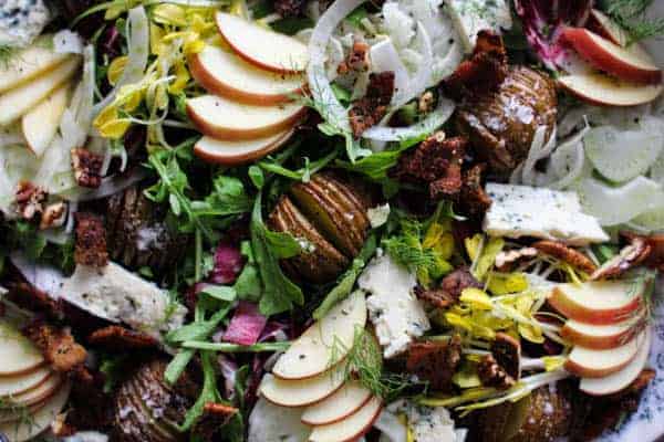 Orchard Inspired Holiday Salad recipe || I love all of the flavors of fall, but apple just happens to be my all-time favorite. This salad is brimming with apple goodness and all of the flavors that pair so well with it like Simply Artisan Reserve Gorgonzola Center Cut Cheese, crispy bacon, thinly shaved fennel, candied pecans, and bitter greens all slathered in a delicious apple cider dressing! || @thismessisours @litehousefoods #centerofattention #simplyartisanreserve #litehousefoods #ad