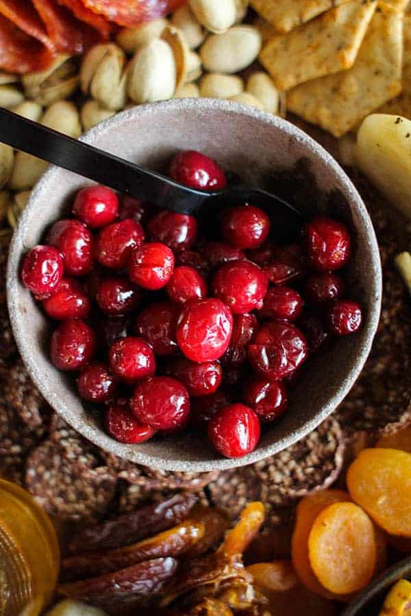 Tart & Tangy Pickled Cranberries recipe || The perfect compliment to any fall salad or charcuterie board. || @thismessisours #vegan #Thanksgiving
