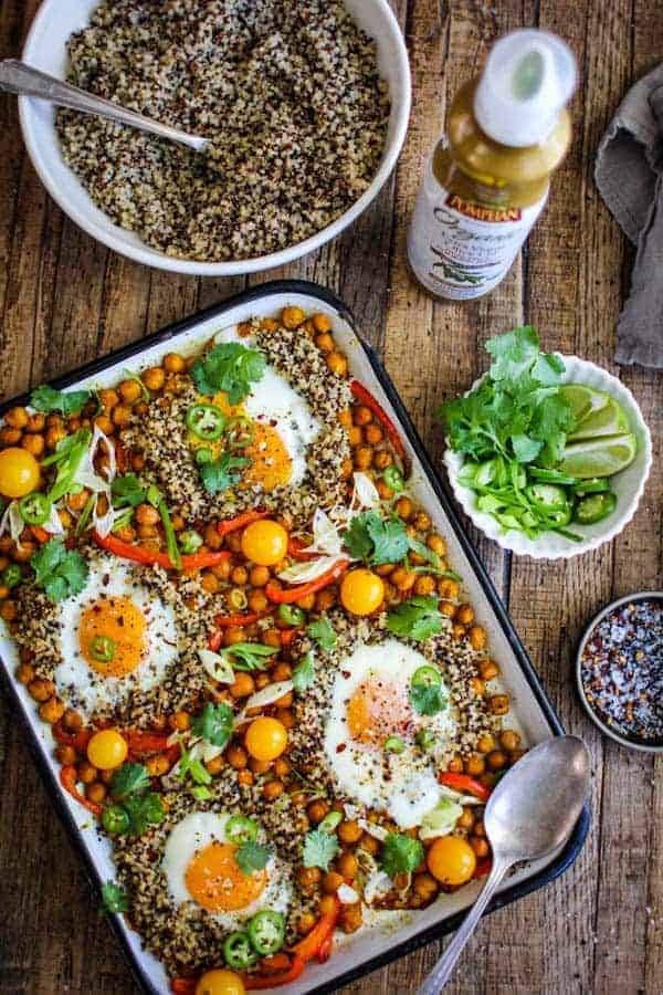Sheet-Pan Indian Spiced Chickpeas and Eggs recipe || This easy weeknight dinner comes together quickly with minimum hands on time for busy weeknights. toss in shredded rotisserie chicken for for the meat eaters at your table or leave as as for meatless Monday! || @thismessisours #TrendingInTheKitchen @pompeian #ad