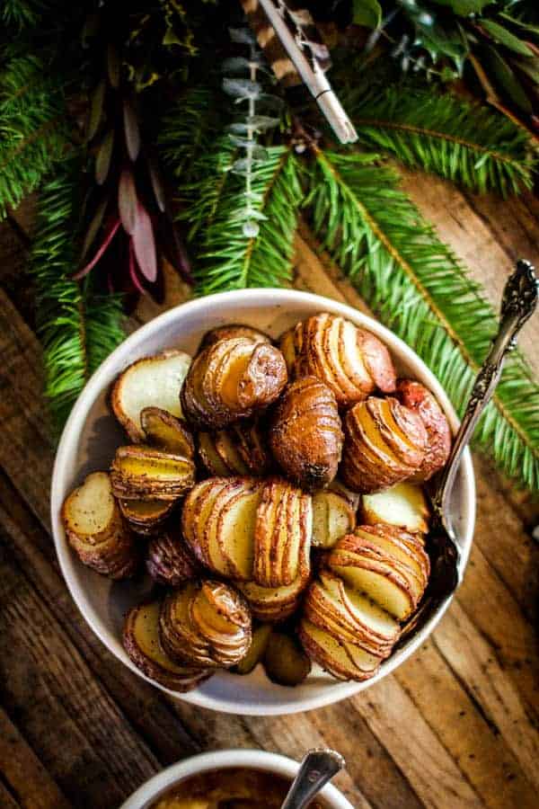 Perfectly Roasted Christmas Potatoes recipe || Forget the mash, opt for the roasted hasselback this holiday season! || @thismessisours #vegan #glutenfree