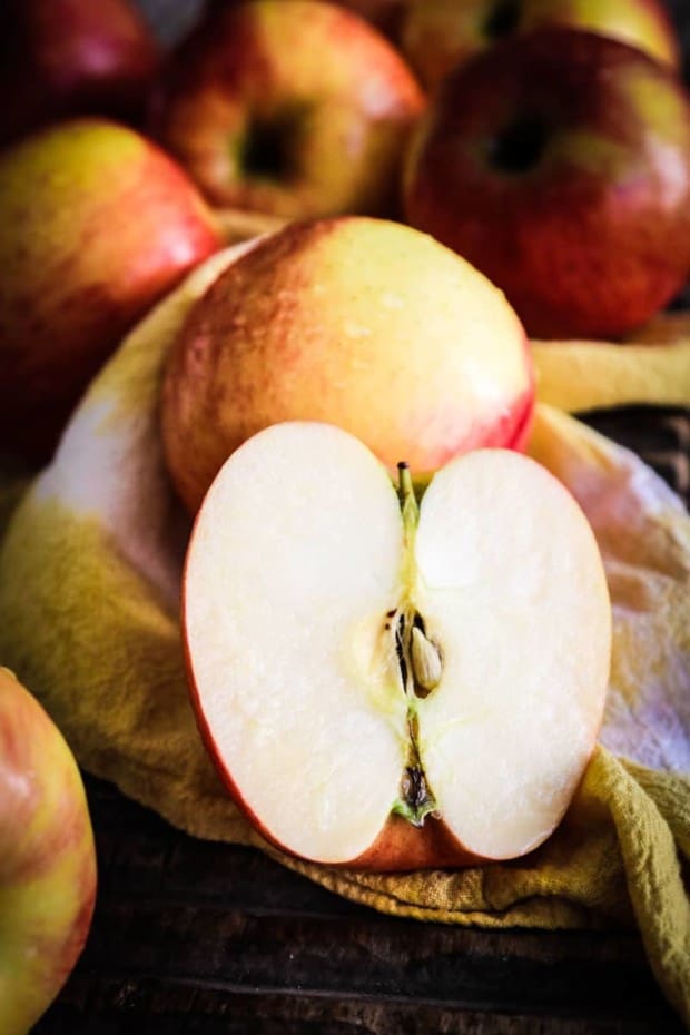 Apples on a cutting board ready to make Instant Pot Applesauce 