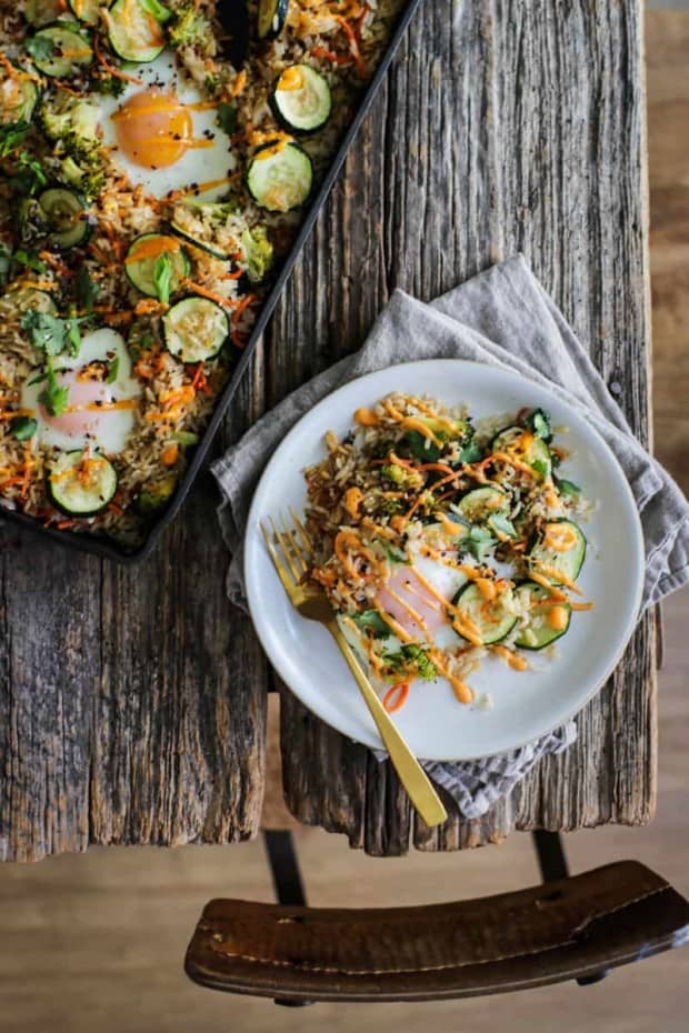 A pan of sheet pan fried rice and a plate served with sheet pan fried rice