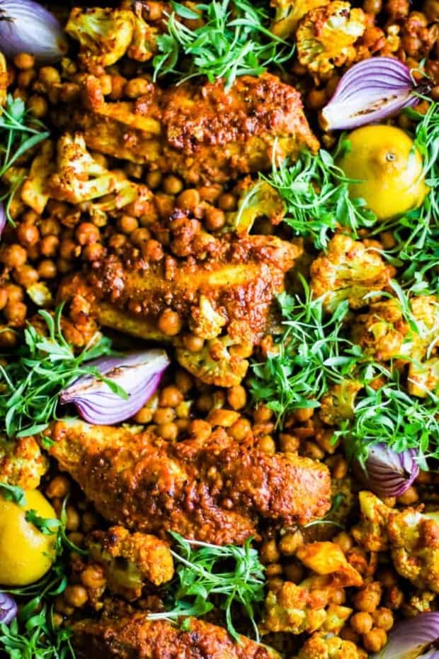 Shawarma Spiced Chicken Sheet Pan Dinner with chicken, cauliflower, chickpeas, red onion, lemon and cilantro