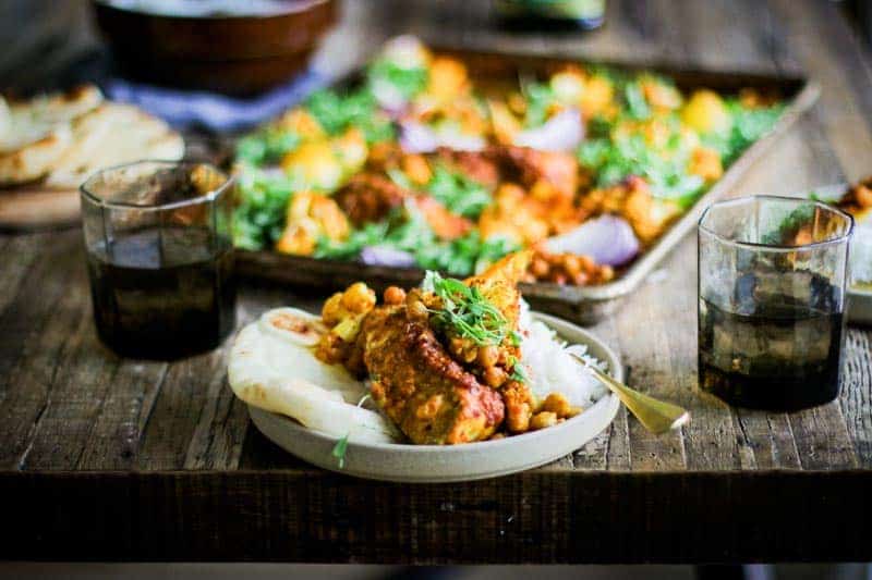 Shawarma Spiced Chicken Sheet Pan Dinner plated with white rice and naan bread