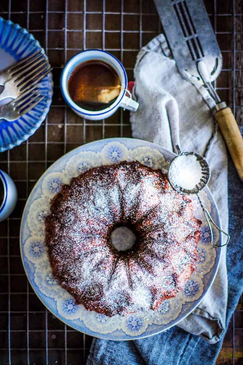 Apple chai monkey bread dusted with powdered sugar and served with chai tea