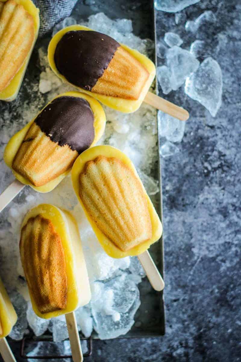 frozen vanilla pudding pops topped with madeleine cookies on top