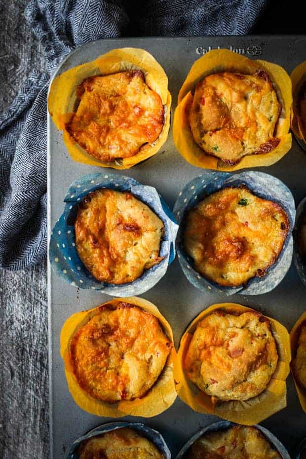 6 pimento cheese muffins in a muffin pan on a table