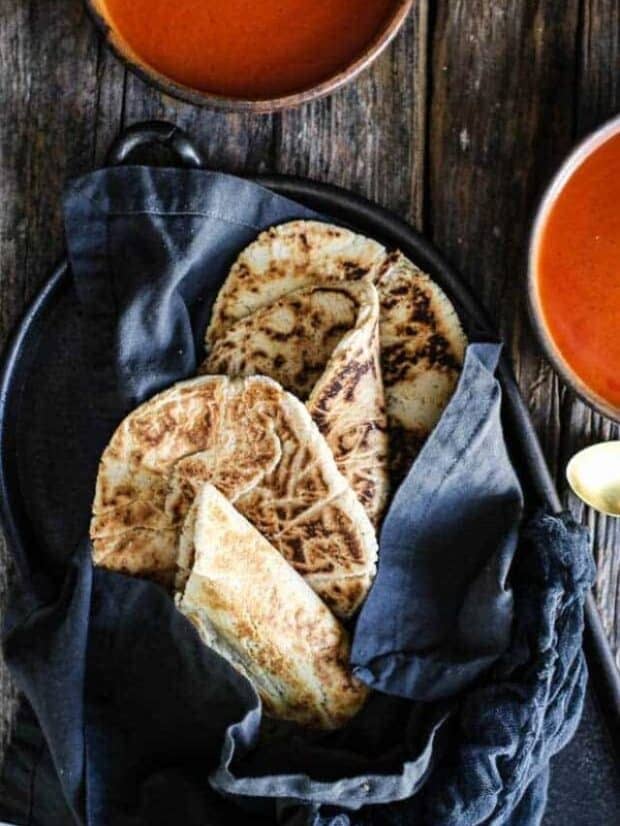 Easy Paleo Naan Bread recipe || Only 5 ingredients and a little water stand in between you and tender, fluffy #paleo naan bread! No mixer needed, just a bowl, a spoon, and YOU! || @thismessisours