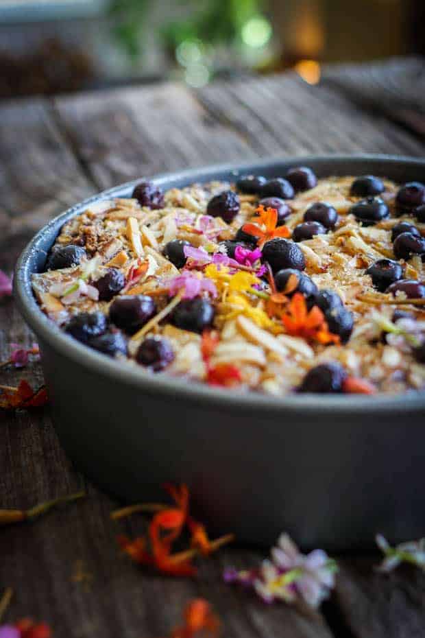 A pan of Blueberry Banana Baked Oatmeal ron a wooden table