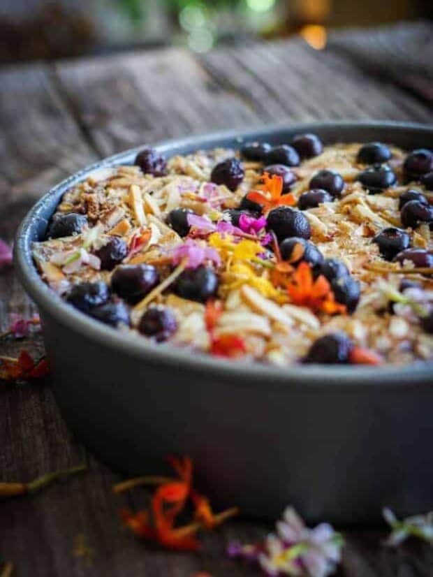 A pan of Blueberry Banana Baked Oatmeal ron a wooden table