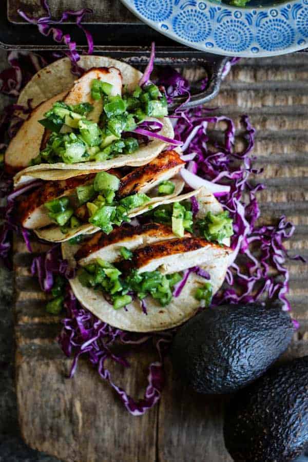 3 Easy Grilled Enchilada Chicken tacos with green salsa and red cabbage