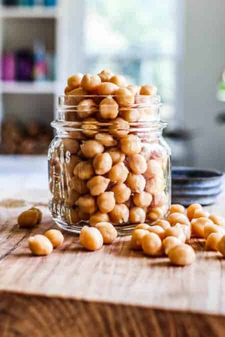 A jar of canned chickpeas on a table