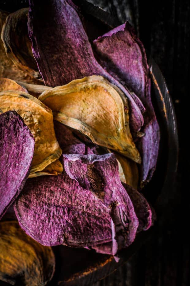 A close up of orange and purple Dehydrated Sweet Potato Dog Treats