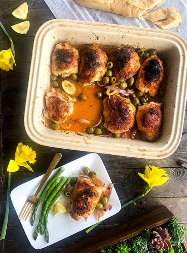 A baking dish of roasted chicken thighs 