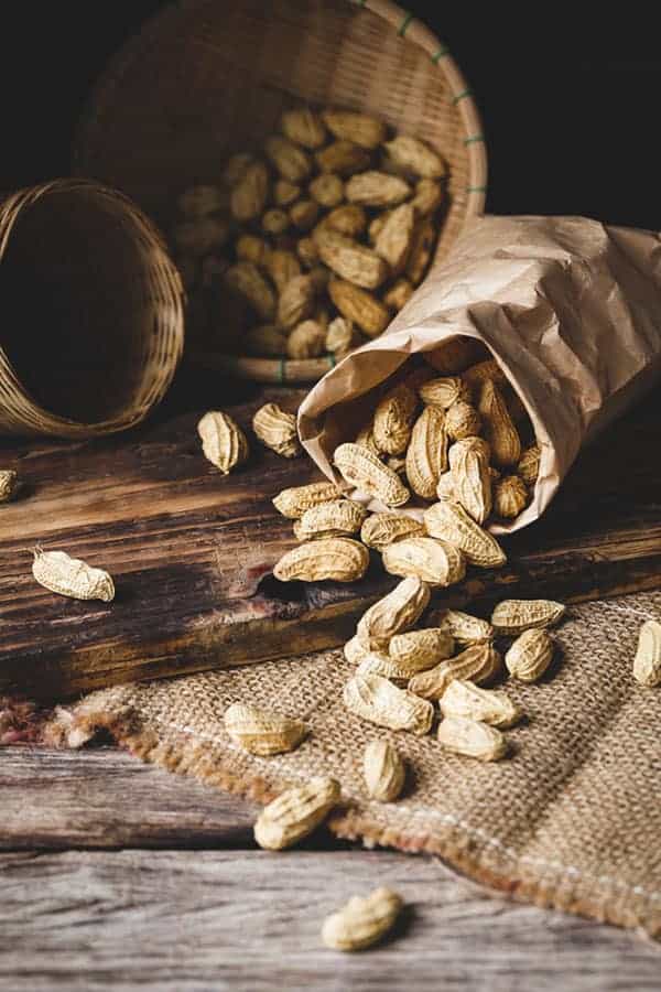 a picture of peanuts spilling out of a bag