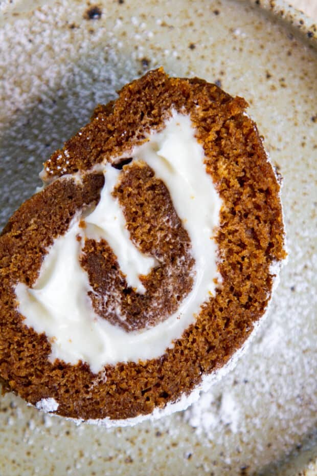 Close up of the best dessert for Thanksgiving, a pumpkin cake roll.