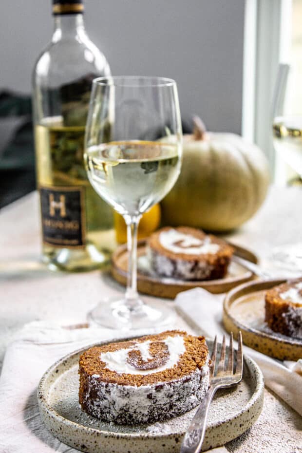Pumpkin cake roll paired with white wine.