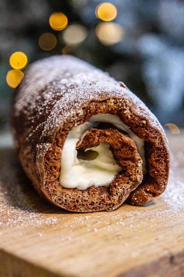 A pumpkin cake roll all rolled up.