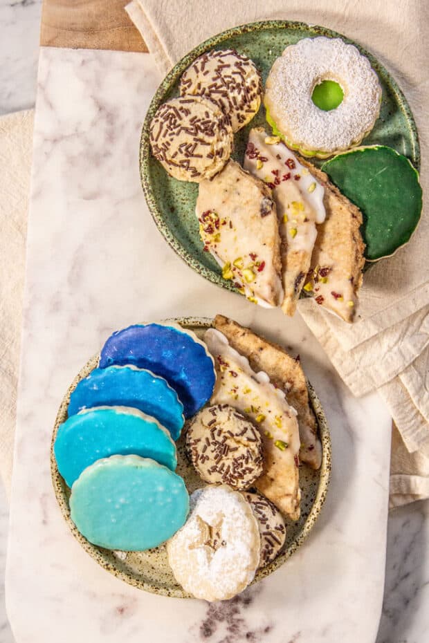 A holiday cookie plate with colorful gluten free iced sugar cookies.