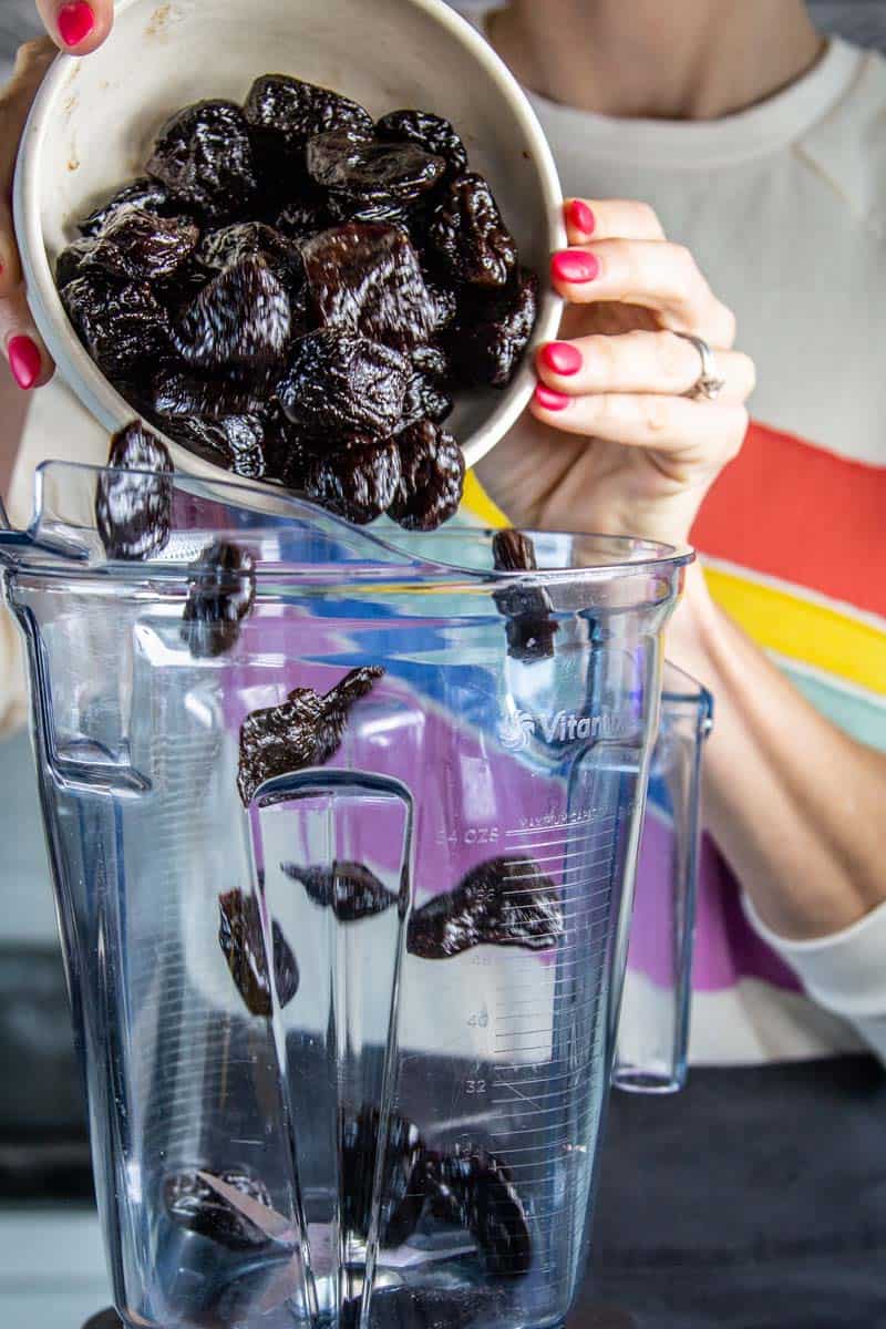 pouring prunes into blender