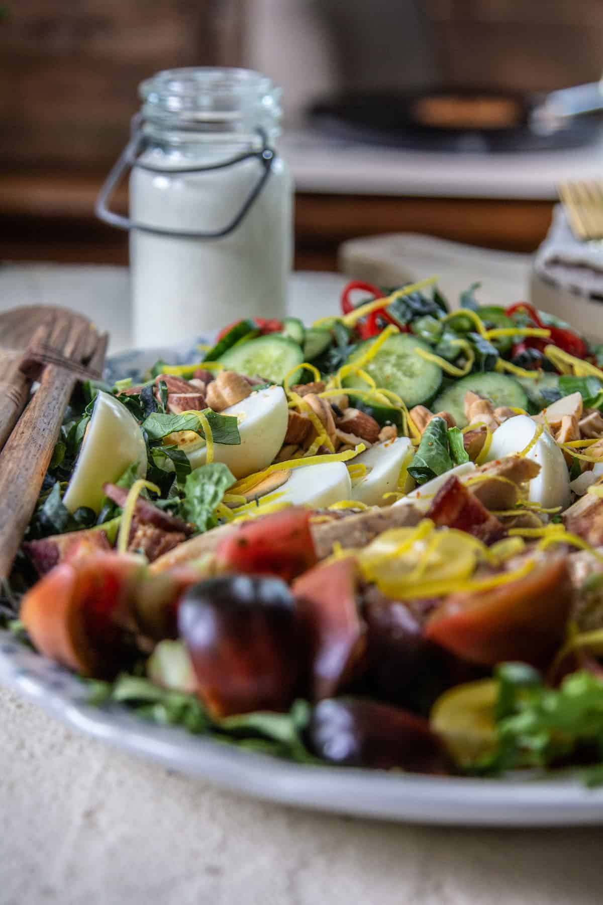salad & salad dressing on light background
