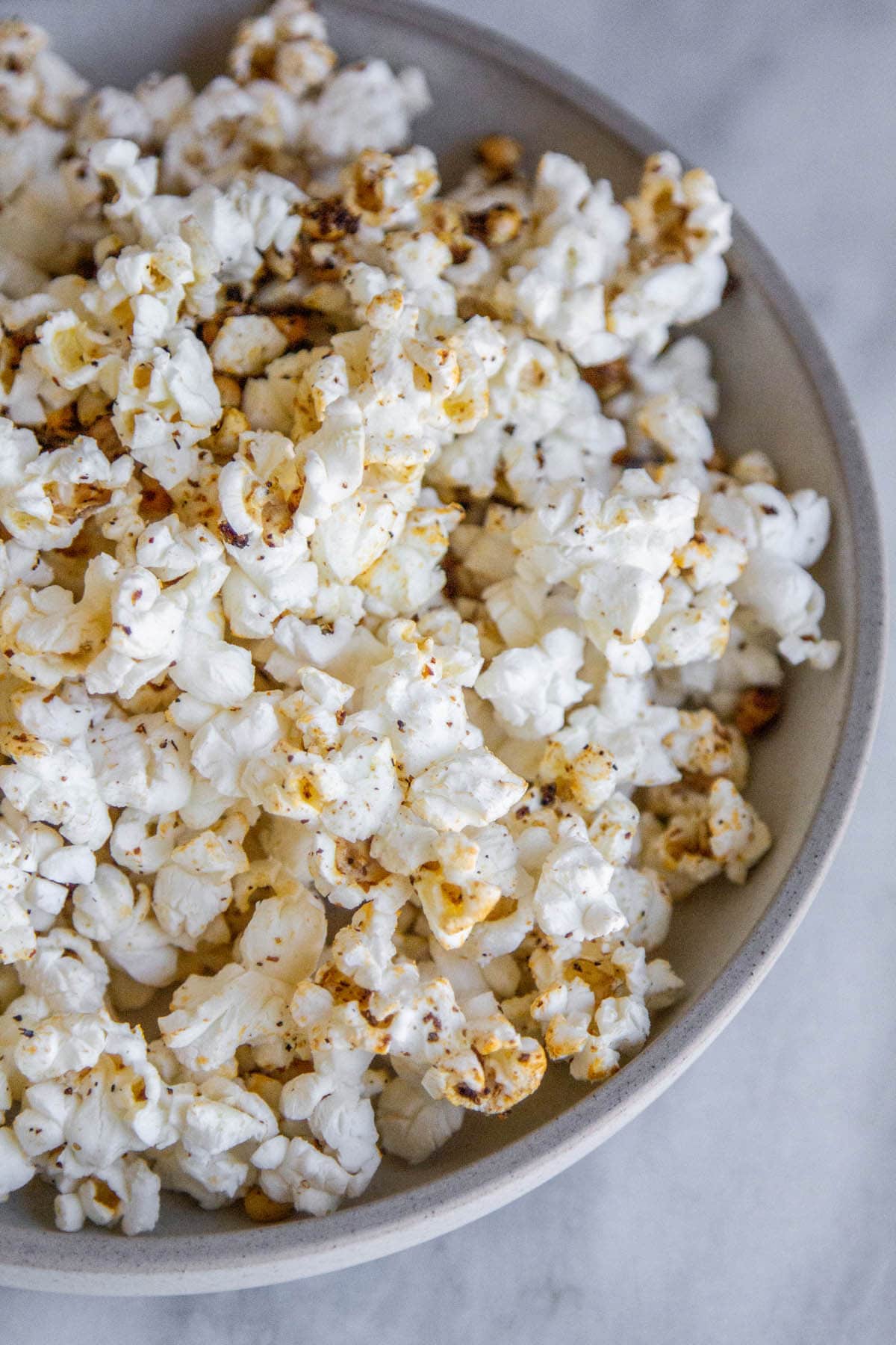 overhead shot of a bowl of tajin popcorn